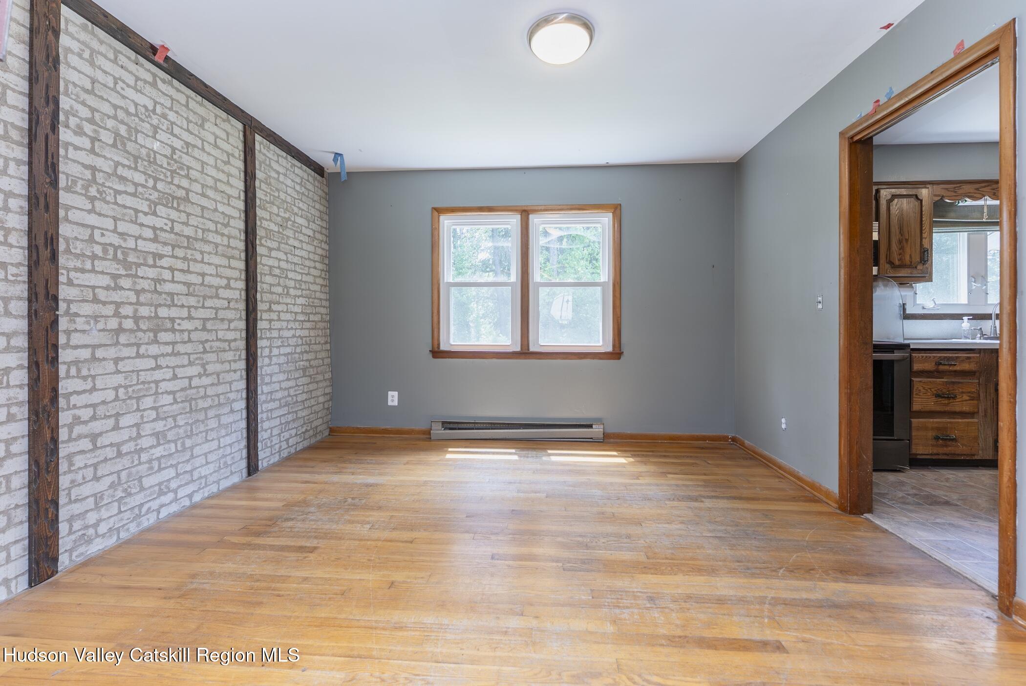22 Robert Drive Hyde Park, NY 12538 - Photo 17 of 52 a view of an empty room with a bathroom and a window