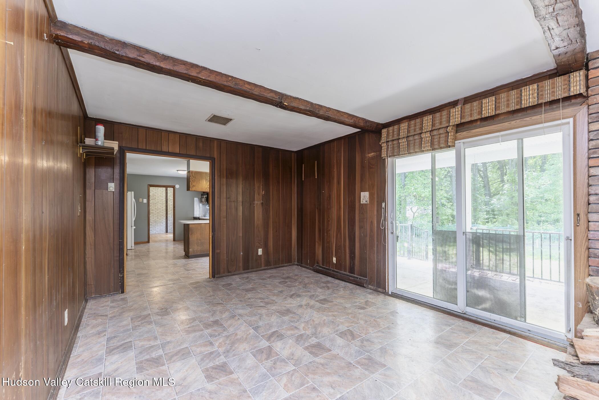 22 Robert Drive Hyde Park, NY 12538 - Photo 23 of 52 a view of a hallway with wooden floor and windows
