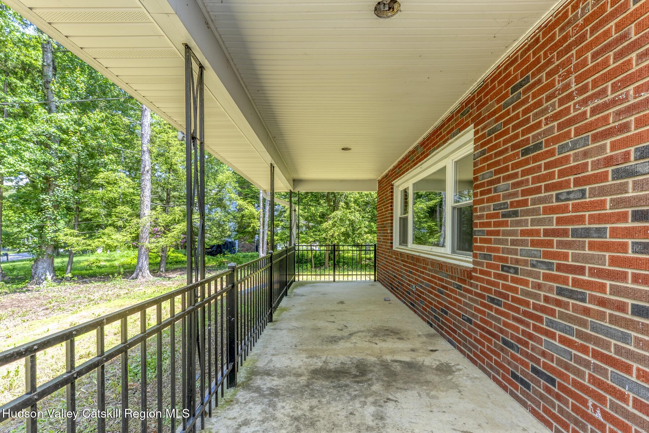 22 Robert Drive Hyde Park, NY 12538 - Photo 3 of 52 a view of a pathway both side of the house