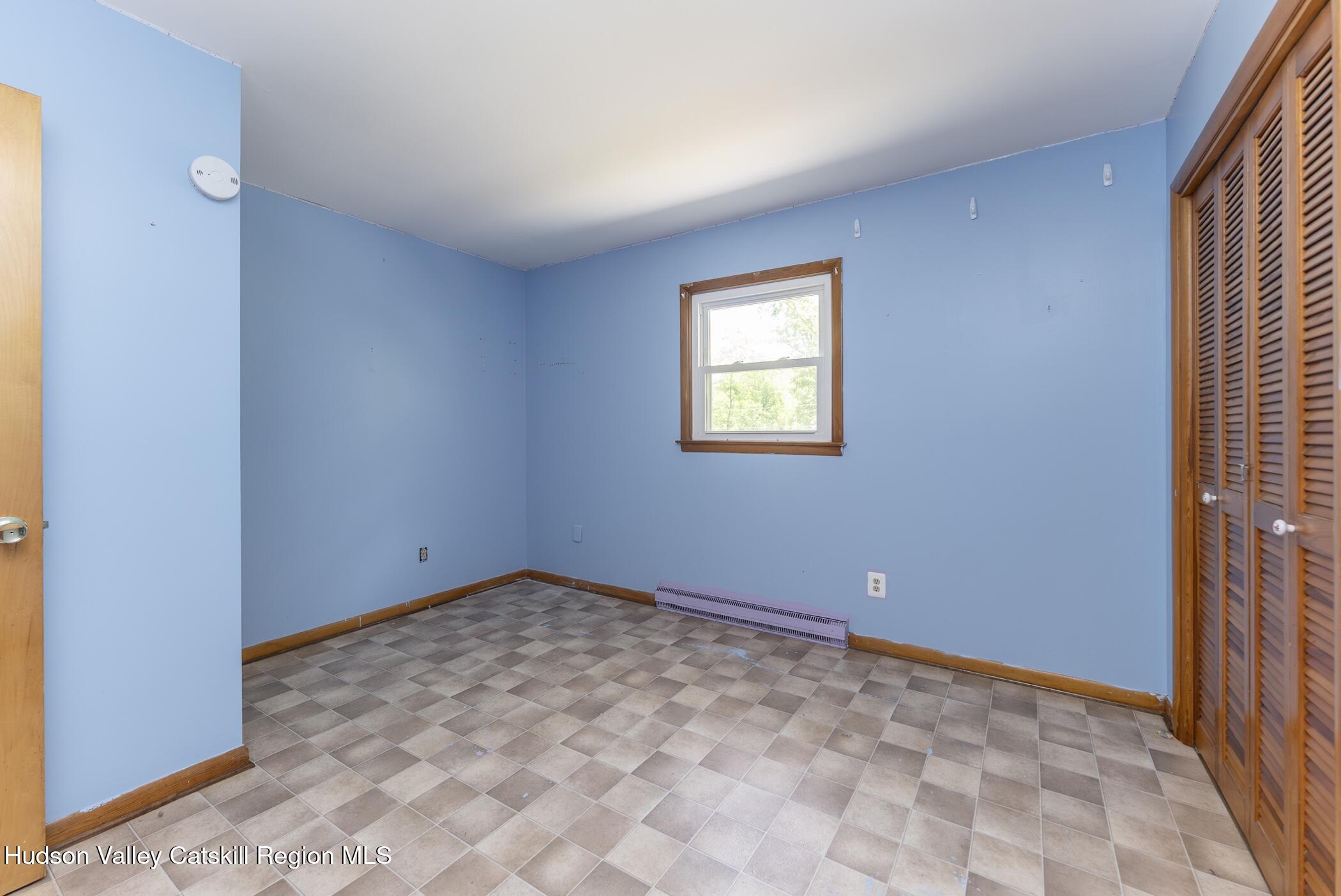 22 Robert Drive Hyde Park, NY 12538 - Photo 32 of 52 a view of an empty room with a window