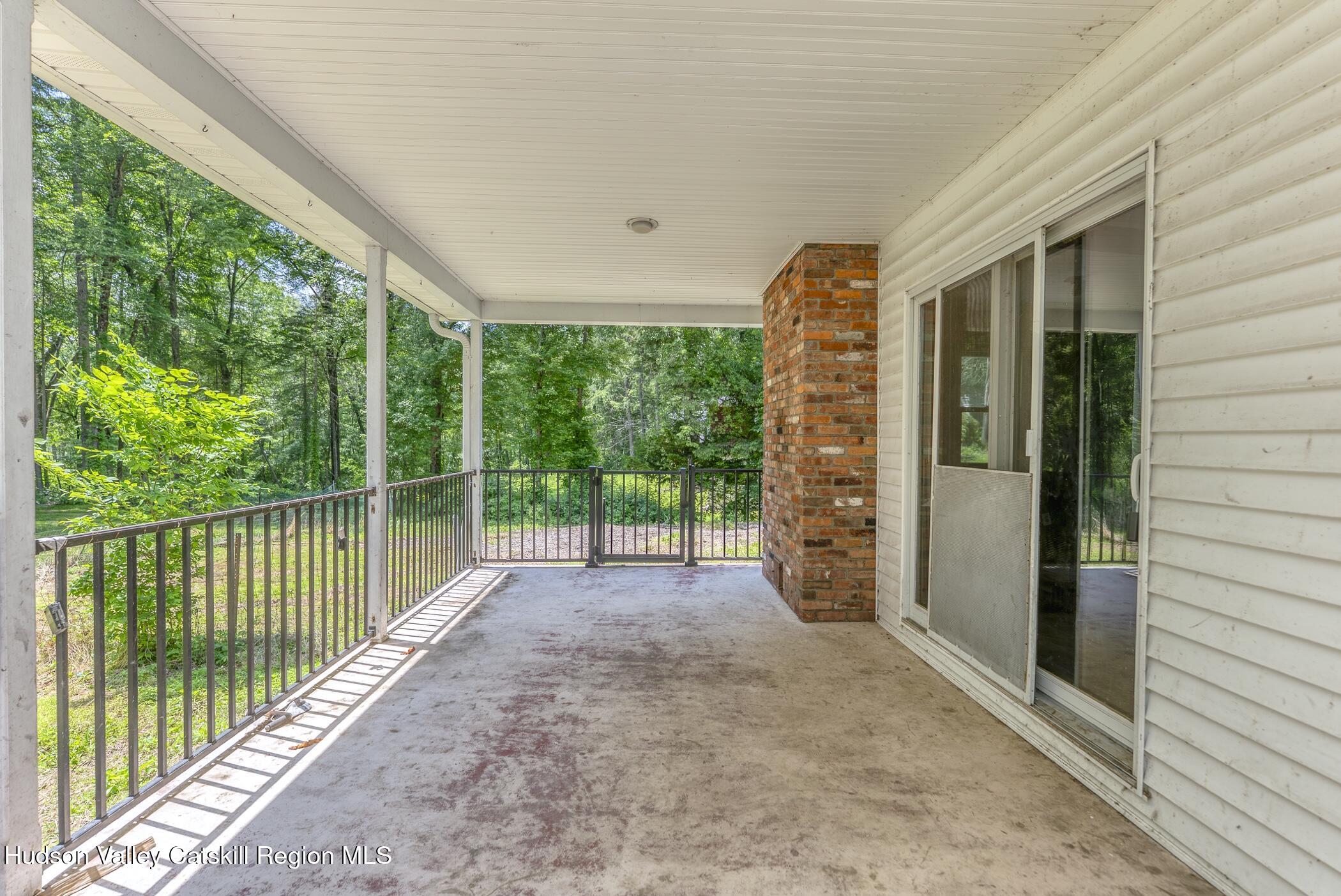 22 Robert Drive Hyde Park, NY 12538 - Photo 39 of 52 a view of a backyard with plants and large tree