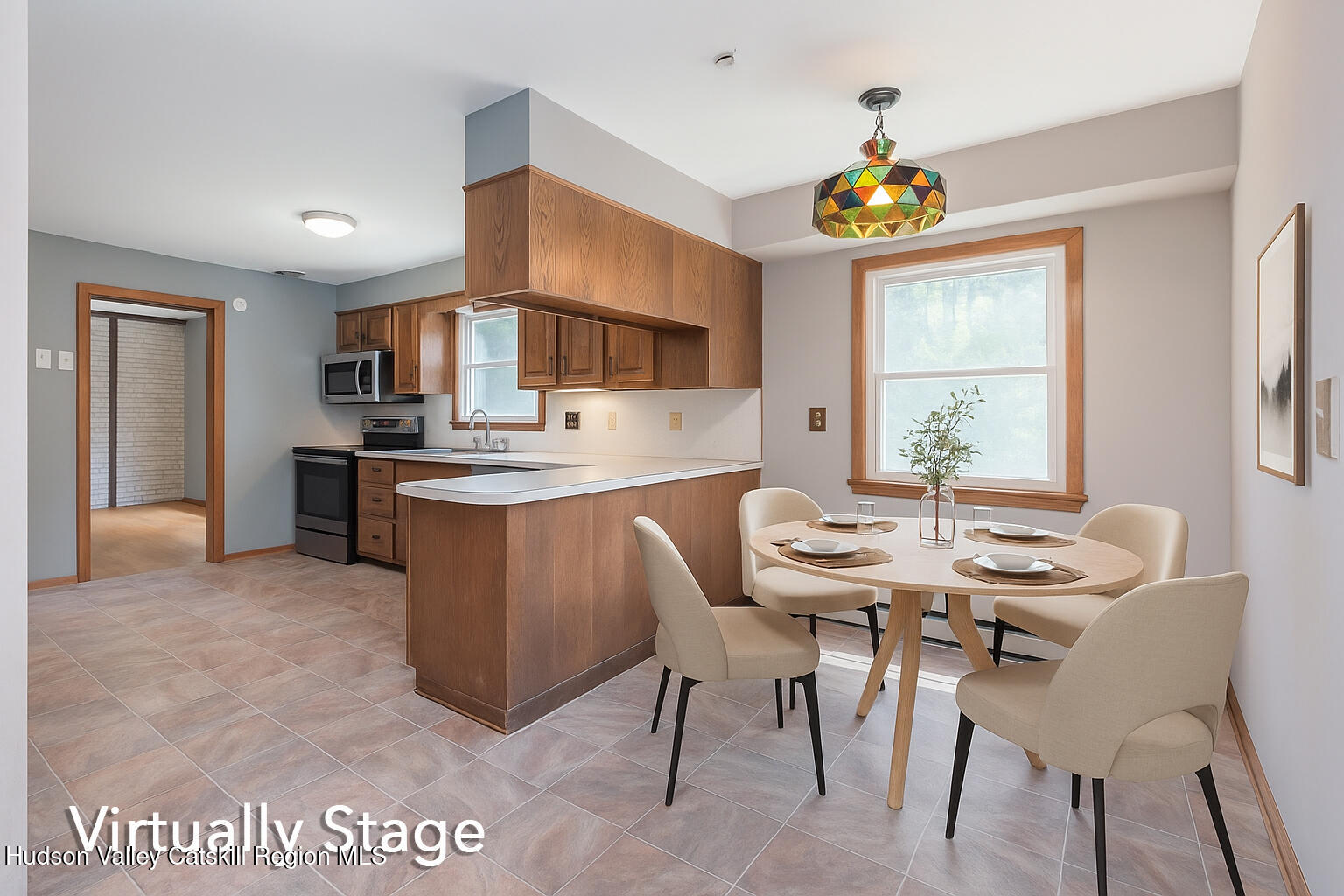 22 Robert Drive Hyde Park, NY 12538 - Photo 10 of 52 a view of a dining room with furniture and a chandelier