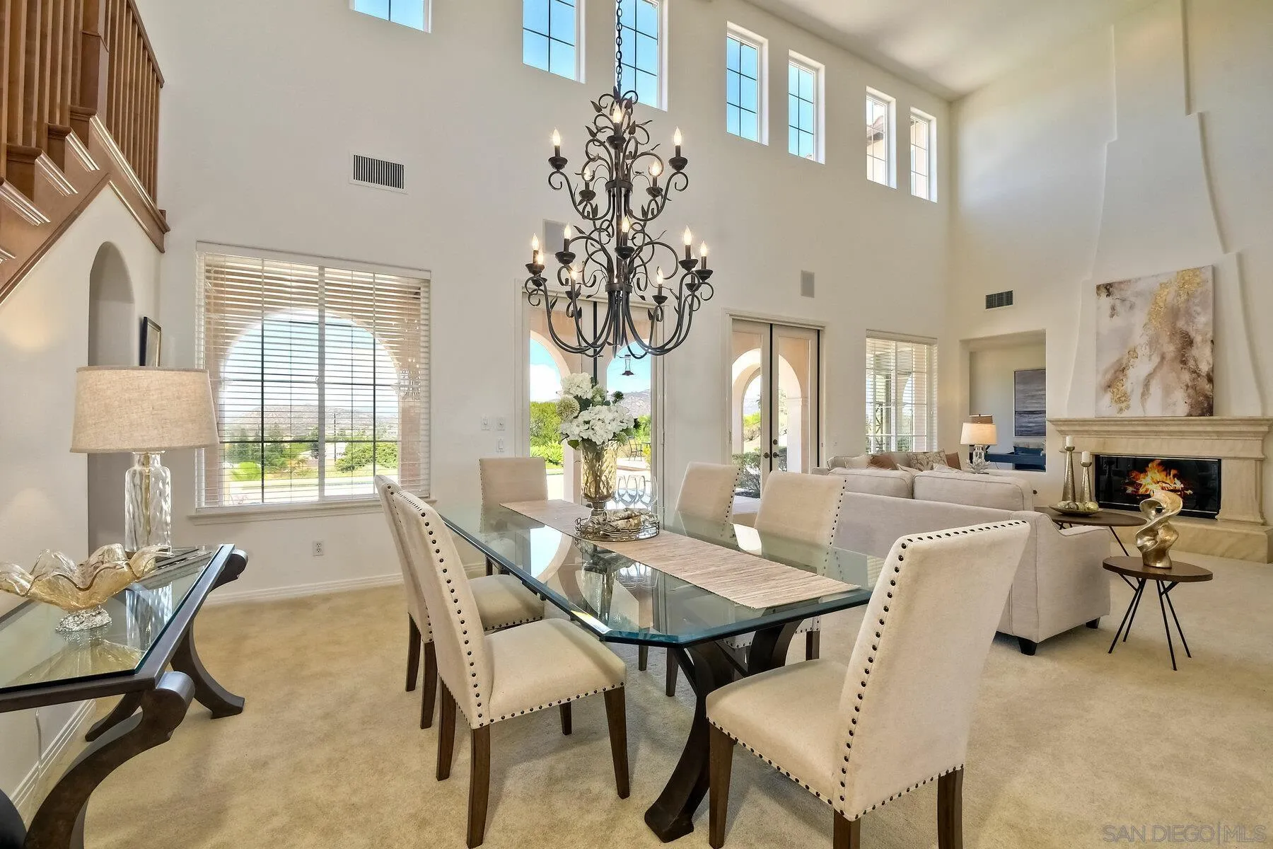13660 Overland Pass Road Poway, CA 92064 - Photo 12 of 61 a view of a dining room with furniture window and wooden floor