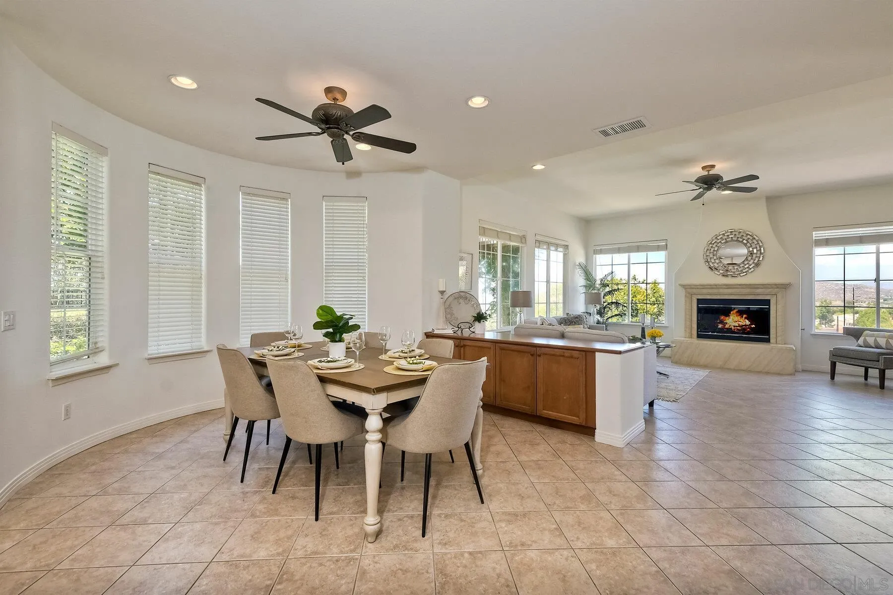 13660 Overland Pass Road Poway, CA 92064 - Photo 20 of 61 a dining room with furniture and window