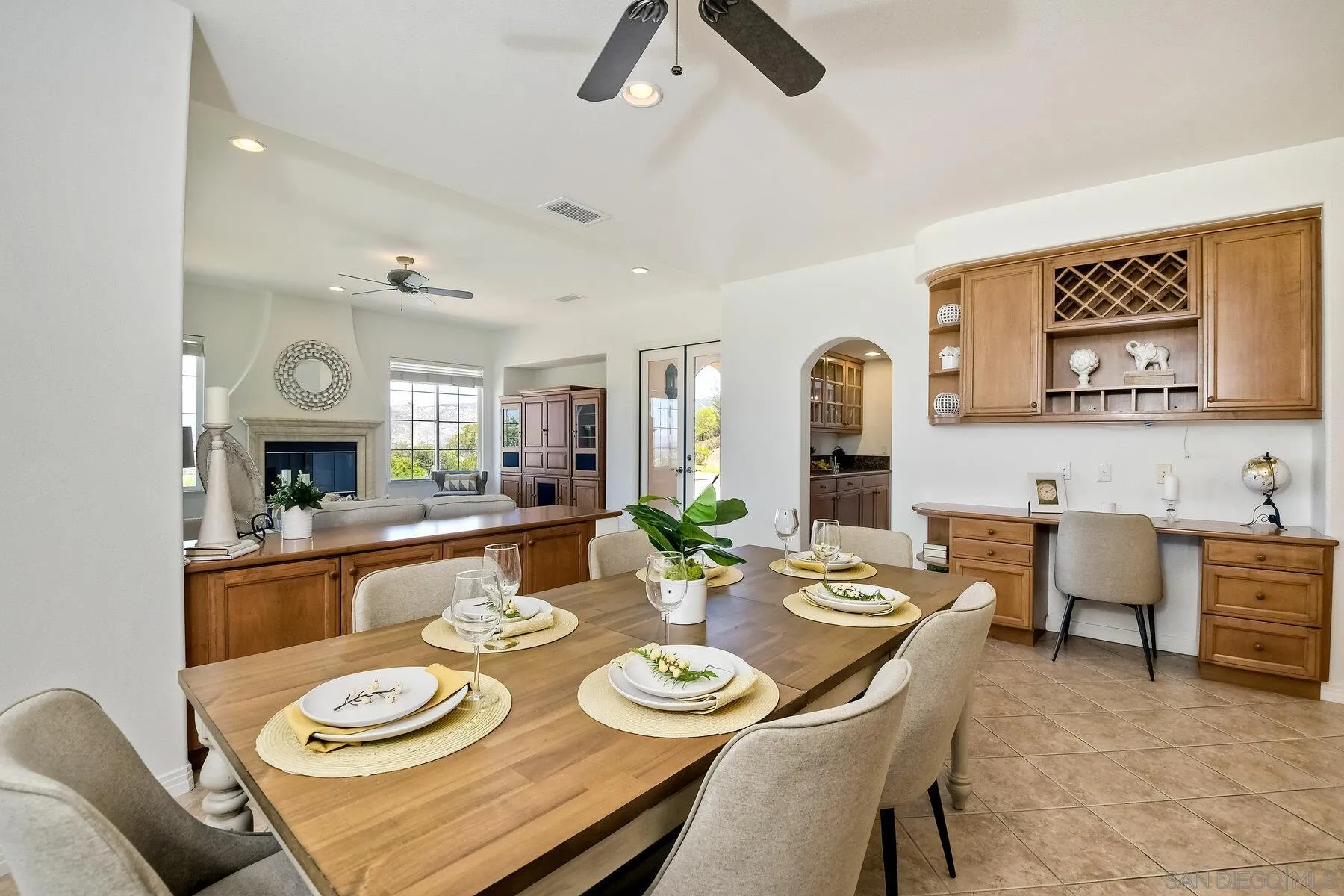 13660 Overland Pass Road Poway, CA 92064 - Photo 22 of 61 a view of a dining room with furniture and wooden floor