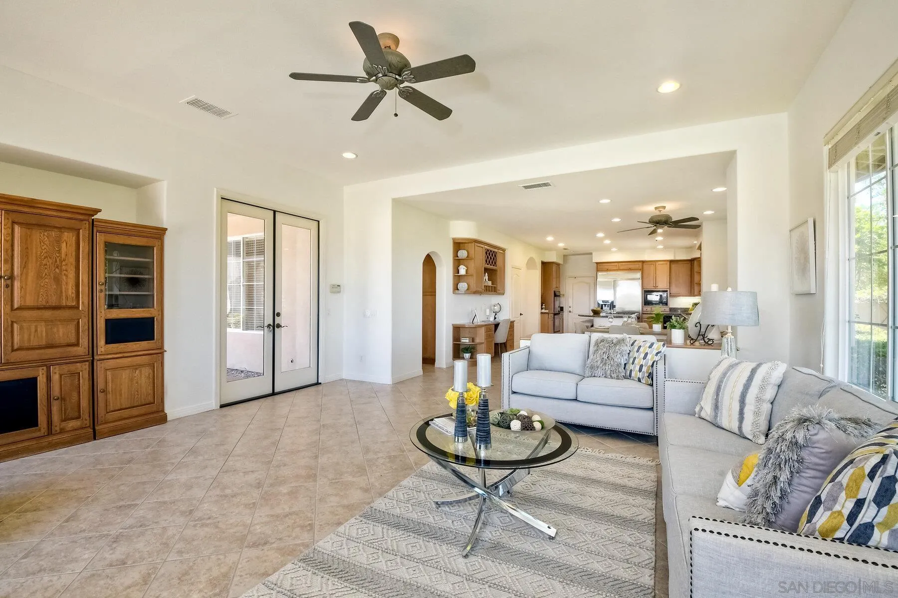 13660 Overland Pass Road Poway, CA 92064 - Photo 24 of 61 a living room with furniture and a large window
