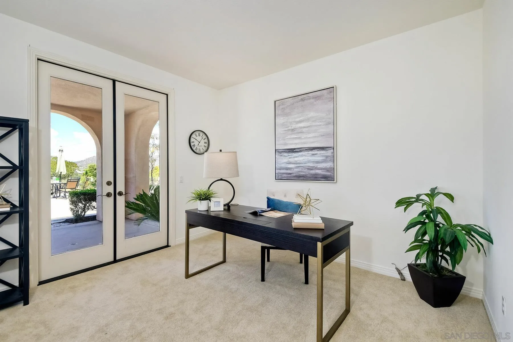 13660 Overland Pass Road Poway, CA 92064 - Photo 30 of 61 a work room with furniture and potted plants