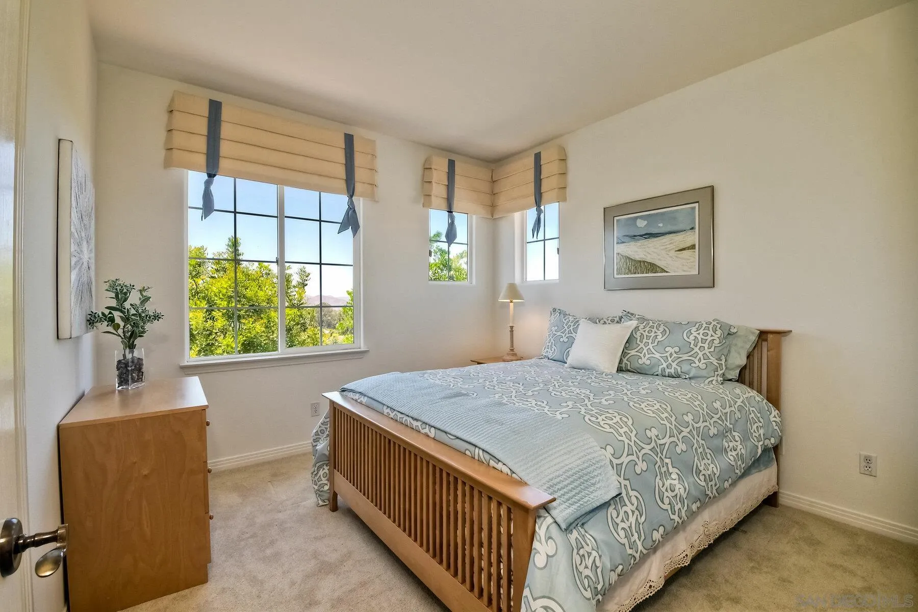 13660 Overland Pass Road Poway, CA 92064 - Photo 31 of 61 a bedroom with a bed and a window