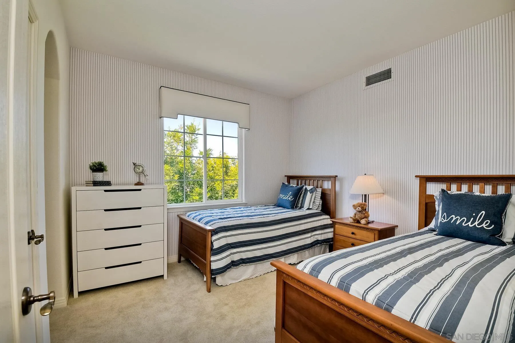 13660 Overland Pass Road Poway, CA 92064 - Photo 35 of 61 a bedroom with two bed and a window