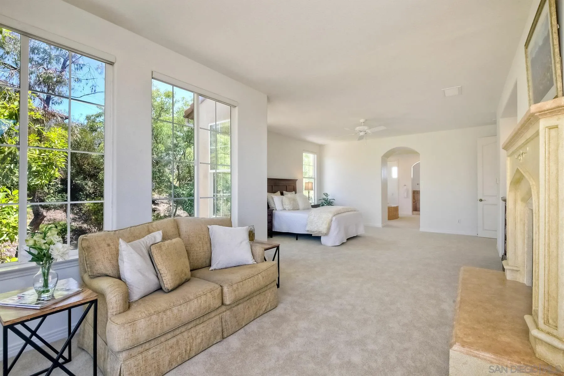 13660 Overland Pass Road Poway, CA 92064 - Photo 42 of 61 a living room with furniture and a large window