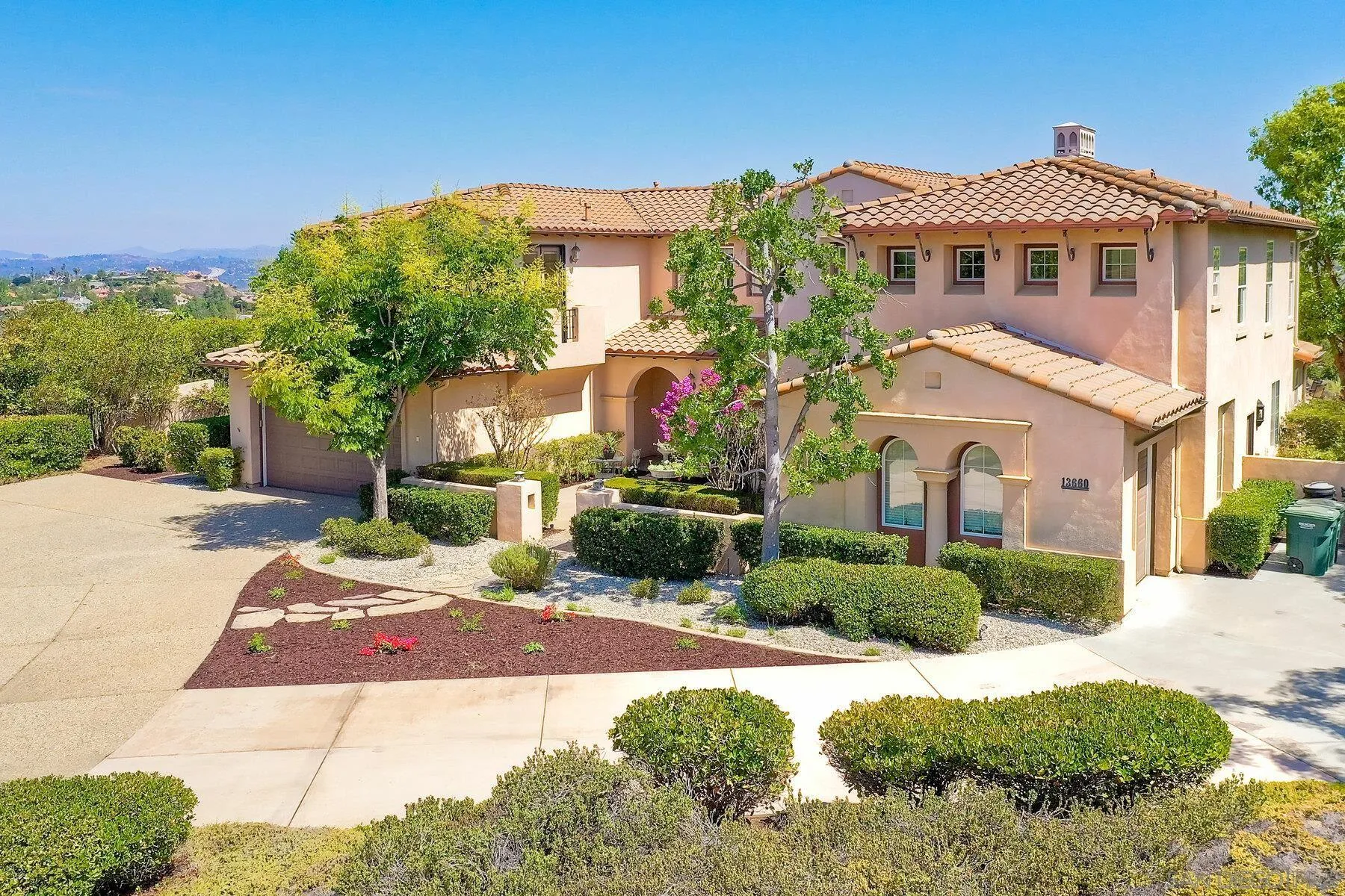 13660 Overland Pass Road Poway, CA 92064 - Photo 49 of 61 a front view of a house with a yard
