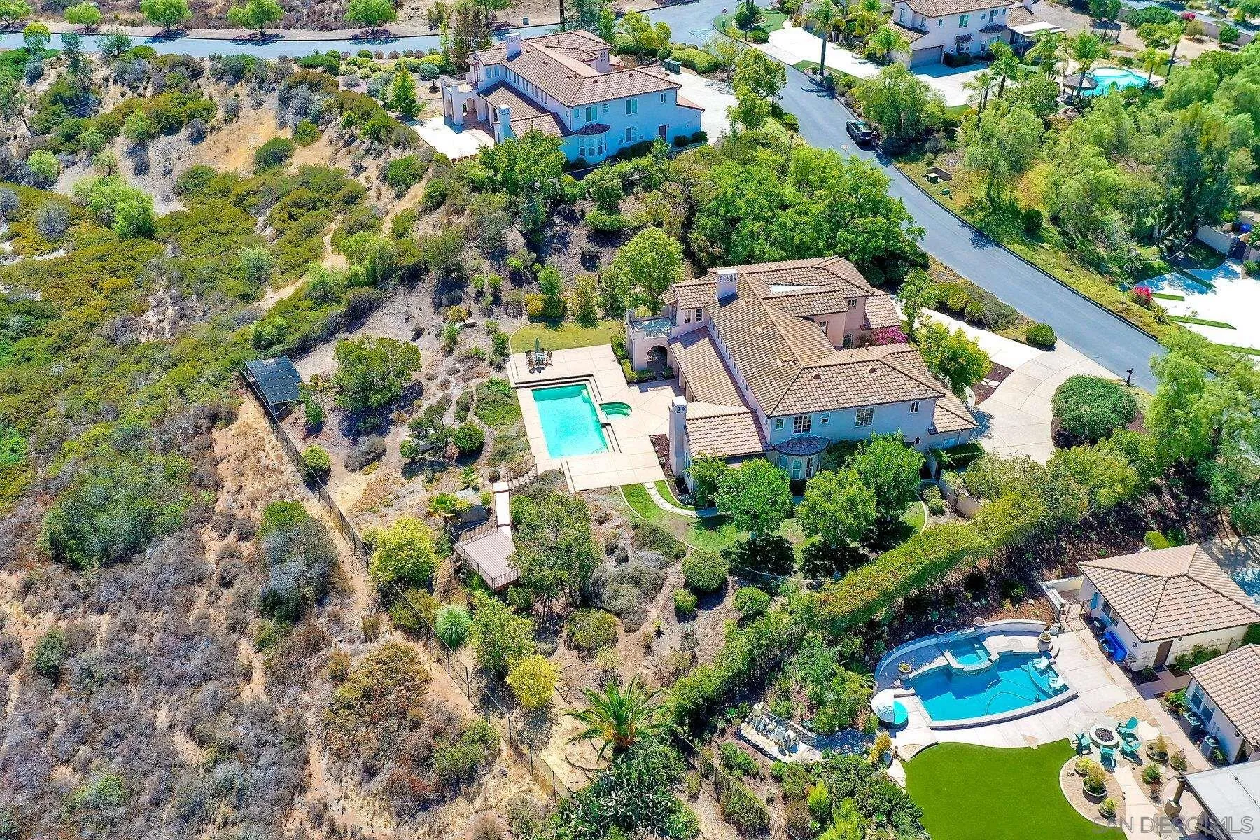 13660 Overland Pass Road Poway, CA 92064 - Photo 51 of 61 an aerial view of residential house with outdoor space and trees all around