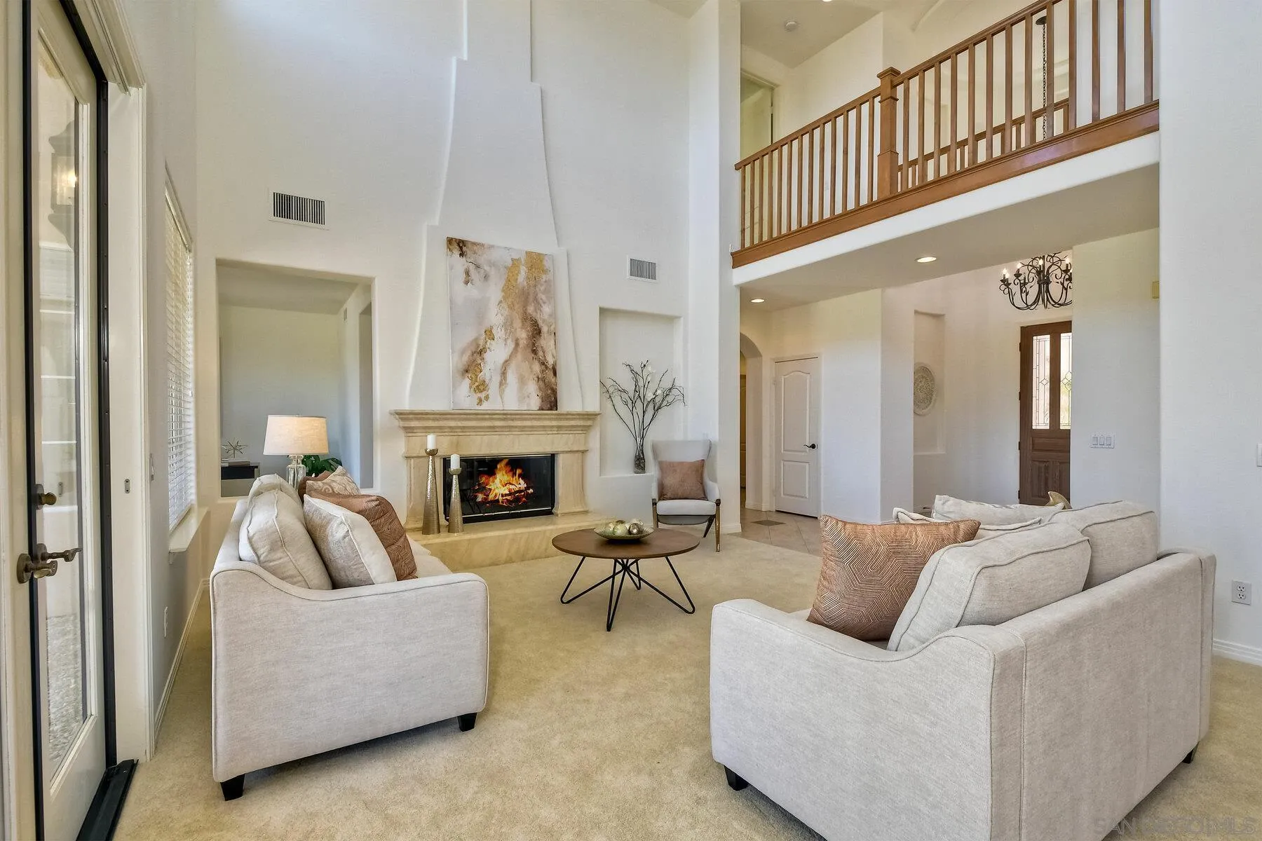 13660 Overland Pass Road Poway, CA 92064 - Photo 9 of 61 a living room with furniture and a fireplace