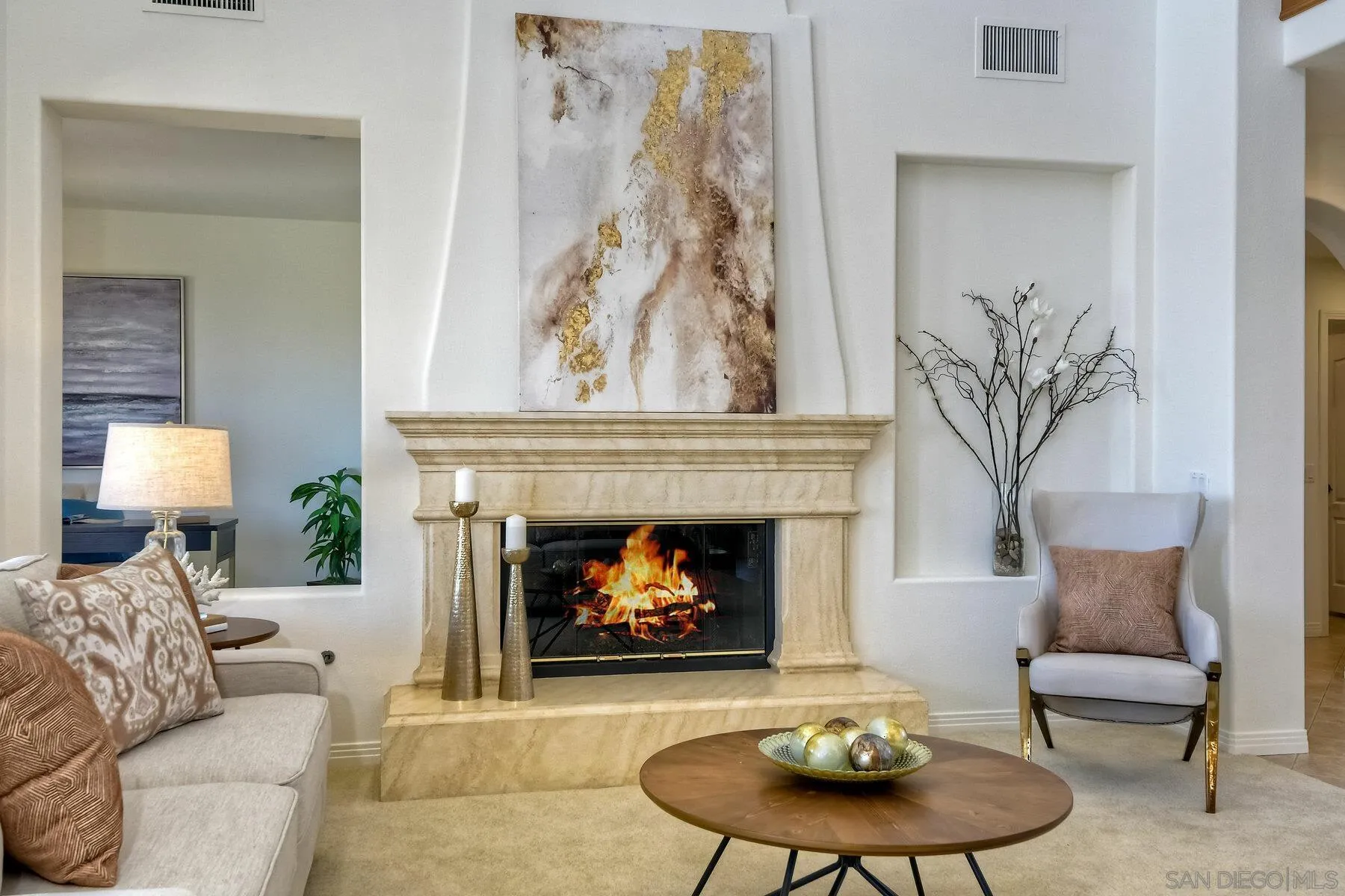 13660 Overland Pass Road Poway, CA 92064 - Photo 10 of 61 a living room with furniture and a fireplace