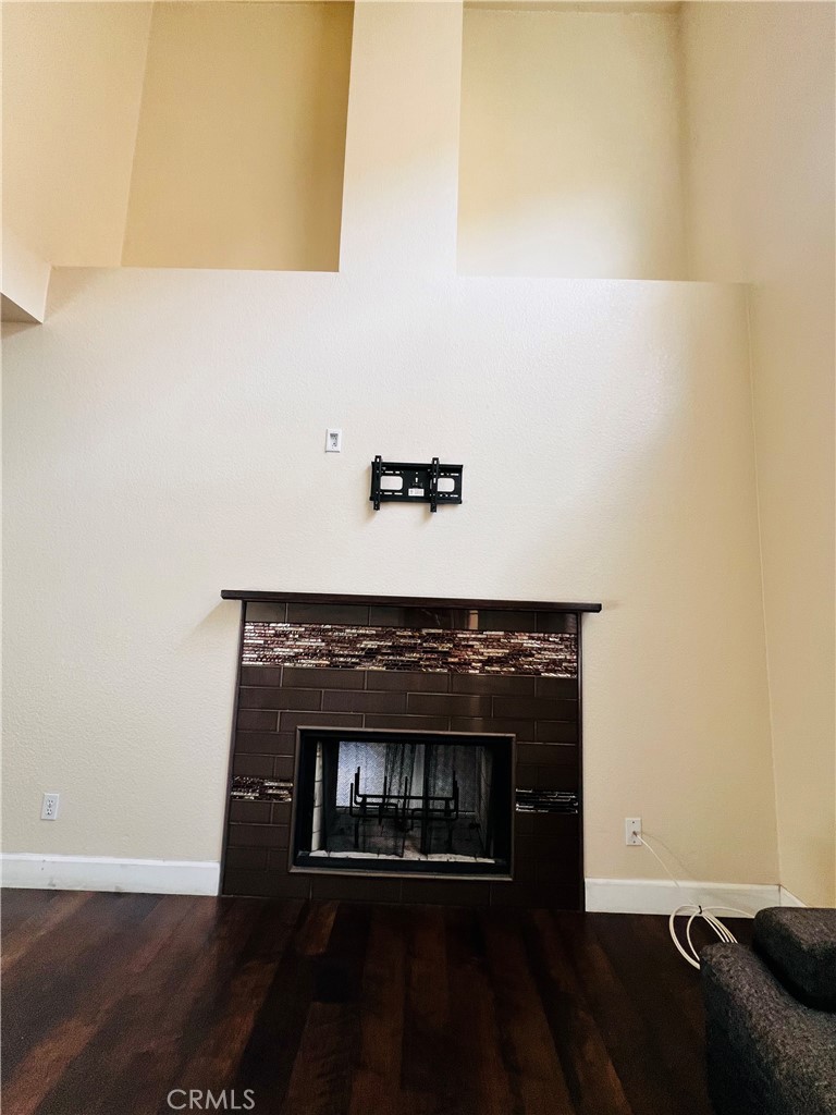 743 Orchard Loop Azusa, CA 91702 - Photo 16 of 38 a living room with a fireplace