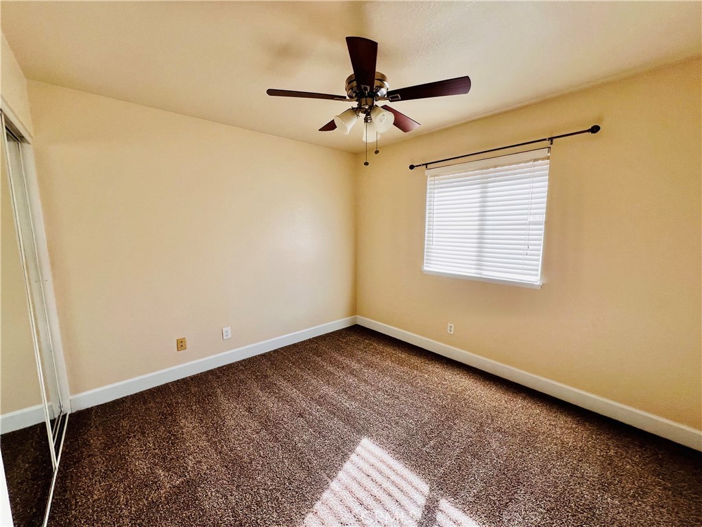 743 Orchard Loop Azusa, CA 91702 - Photo 24 of 38 a view of an empty room with a window