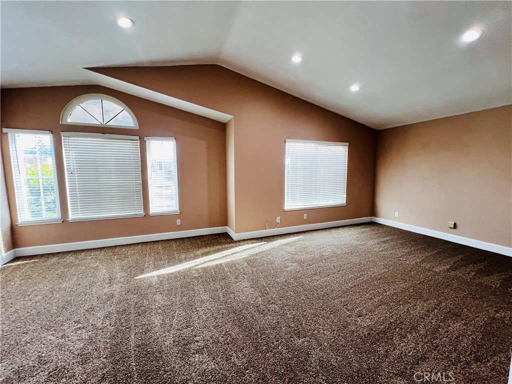 743 Orchard Loop Azusa, CA 91702 - Photo 31 of 38 an empty room with windows