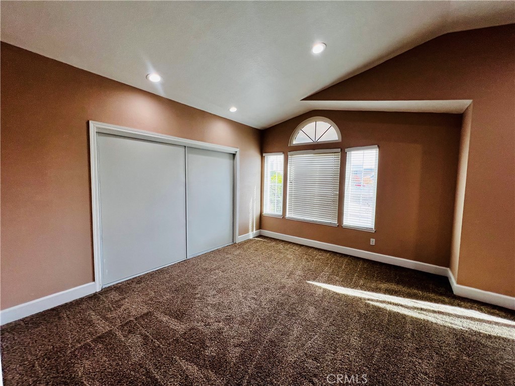 743 Orchard Loop Azusa, CA 91702 - Photo 32 of 38 a view of an empty room with a window