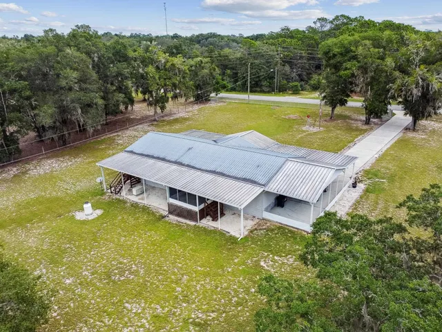 a view of a swimming pool with lounge chair