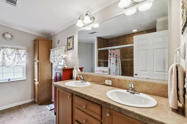 a view of a house with a street