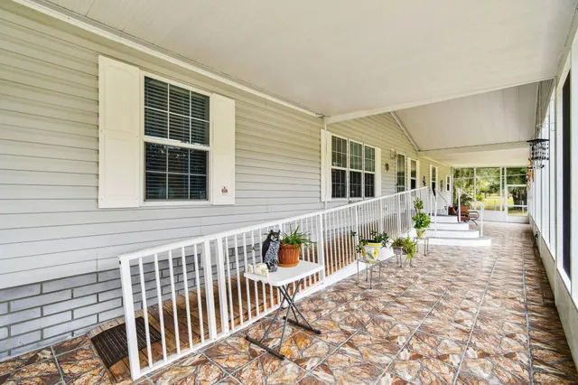 a kitchen with refrigerator and cabinets
