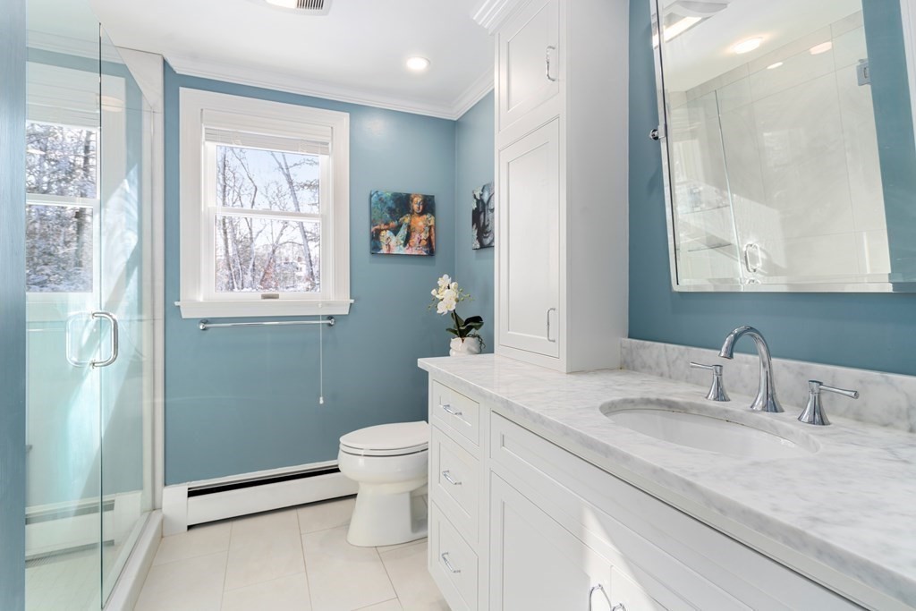 22 Hillcrest Road Weston, MA 02493 - Photo 20 of 31 a bathroom with a sink toilet and shower