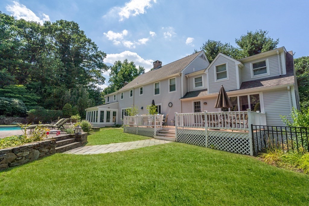 22 Hillcrest Road Weston, MA 02493 - Photo 2 of 31 a front view of house with yard and green space
