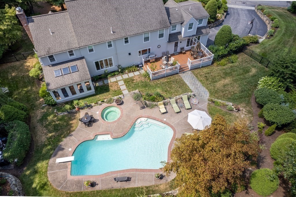22 Hillcrest Road Weston, MA 02493 - Photo 26 of 31 an aerial view of a house swimming pool and outdoor space