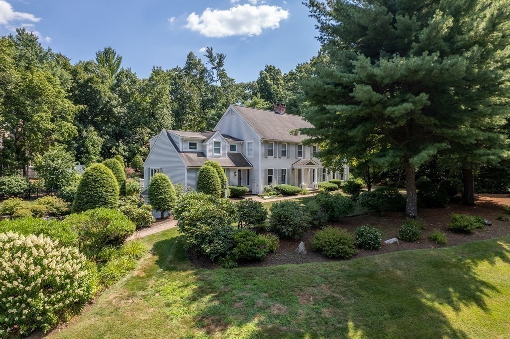 22 Hillcrest Road Weston, MA 02493 - Photo 30 of 31 a front view of a house with garden