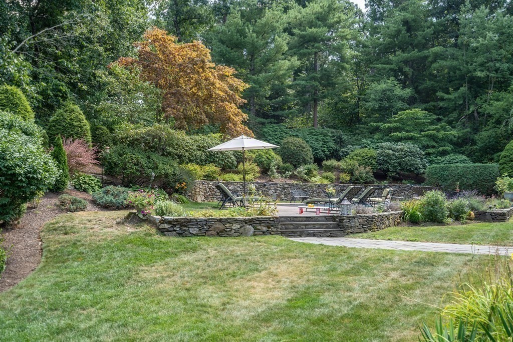 22 Hillcrest Road Weston, MA 02493 - Photo 4 of 31 a view of a garden with large trees