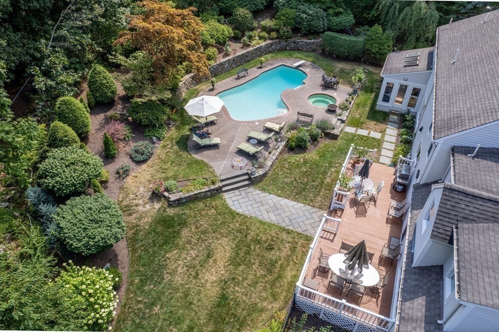 22 Hillcrest Road Weston, MA 02493 - Photo 5 of 31 an aerial view of a house with a yard and lake view
