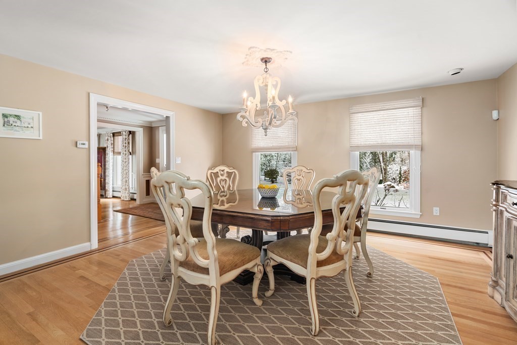 22 Hillcrest Road Weston, MA 02493 - Photo 10 of 31 a view of a dining room with furniture window and wooden floor