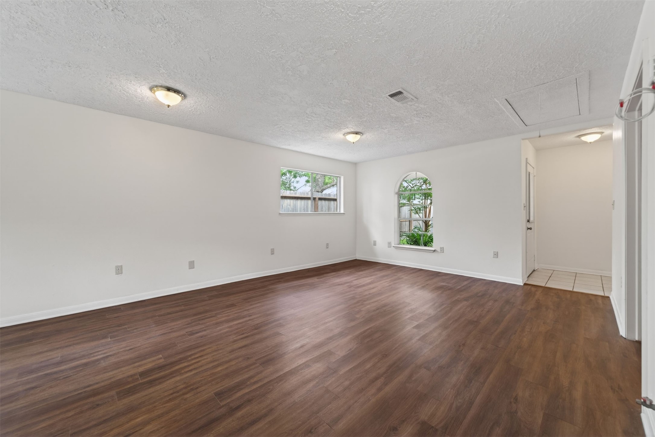 418 Texas Street Tomball, TX 77375 - Photo 5 of 31 (Virtually staged/AI enhanced). Image does not represent actual property as is.