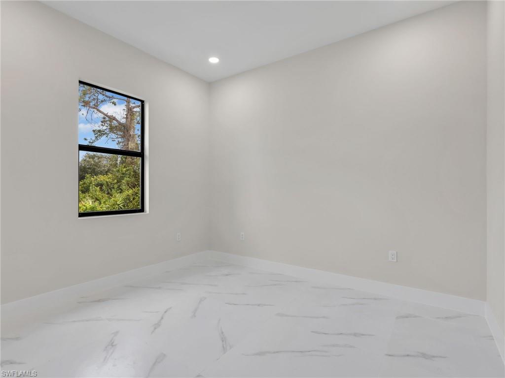350 Delaware Road Lehigh Acres, FL 33936 - Photo 19 of 30 a view of an empty room