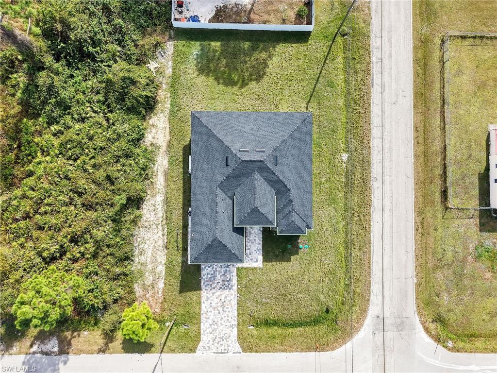 350 Delaware Road Lehigh Acres, FL 33936 - Photo 29 of 30 view of a door and outdoor space