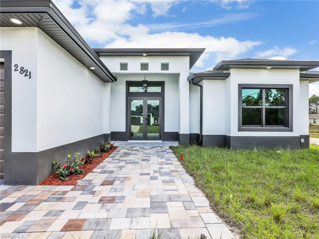 350 Delaware Road Lehigh Acres, FL 33936 - Photo 4 of 30 a front view of a house