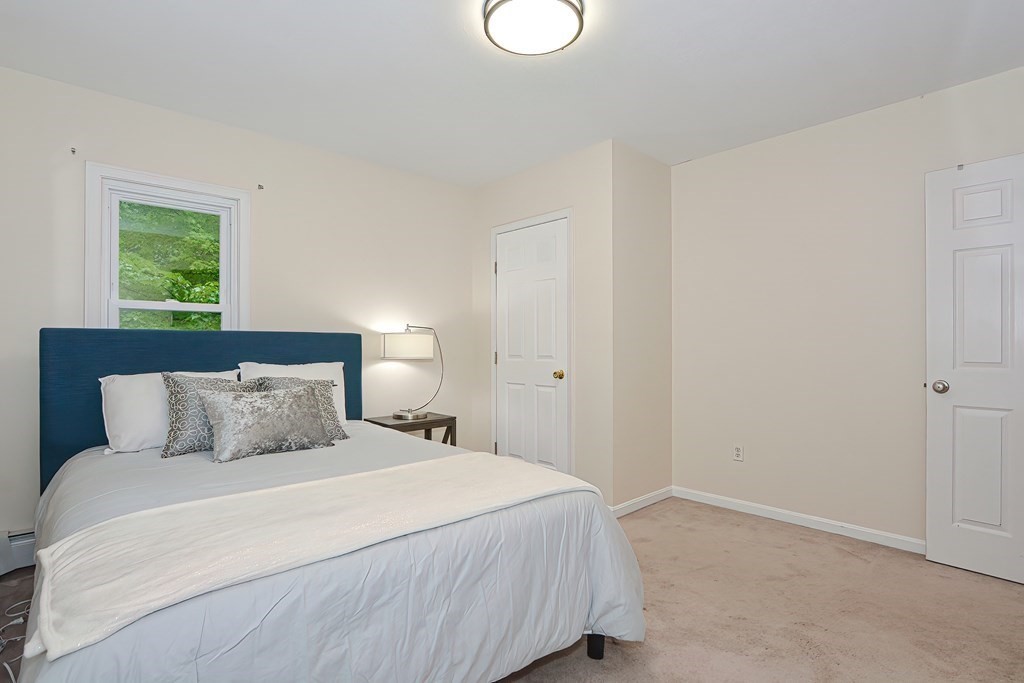 7 Proctor Road Pepperell, MA 01463 - Photo 21 of 40 a bedroom with a bed and a window