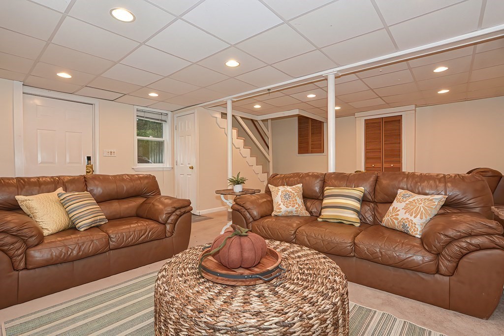 7 Proctor Road Pepperell, MA 01463 - Photo 28 of 40 a living room with furniture and a window