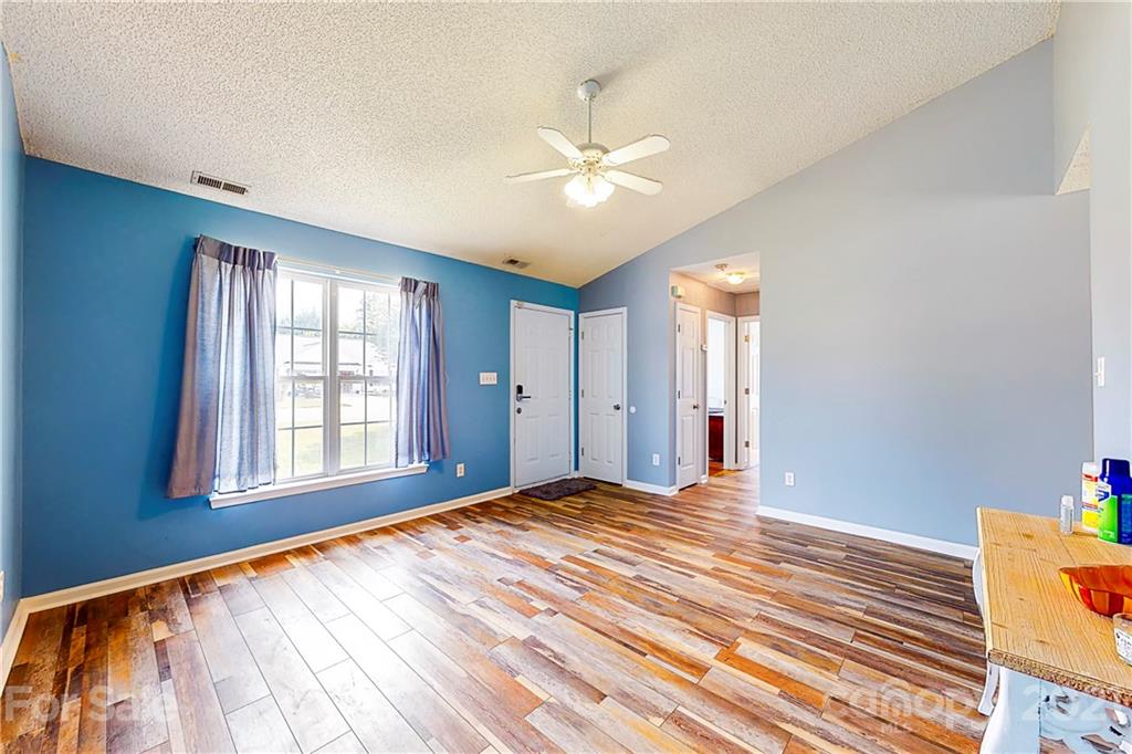 4262 Barley Street Southwest Concord, NC 28027 - Photo 15 of 27 a view of an empty room with window and bathroom