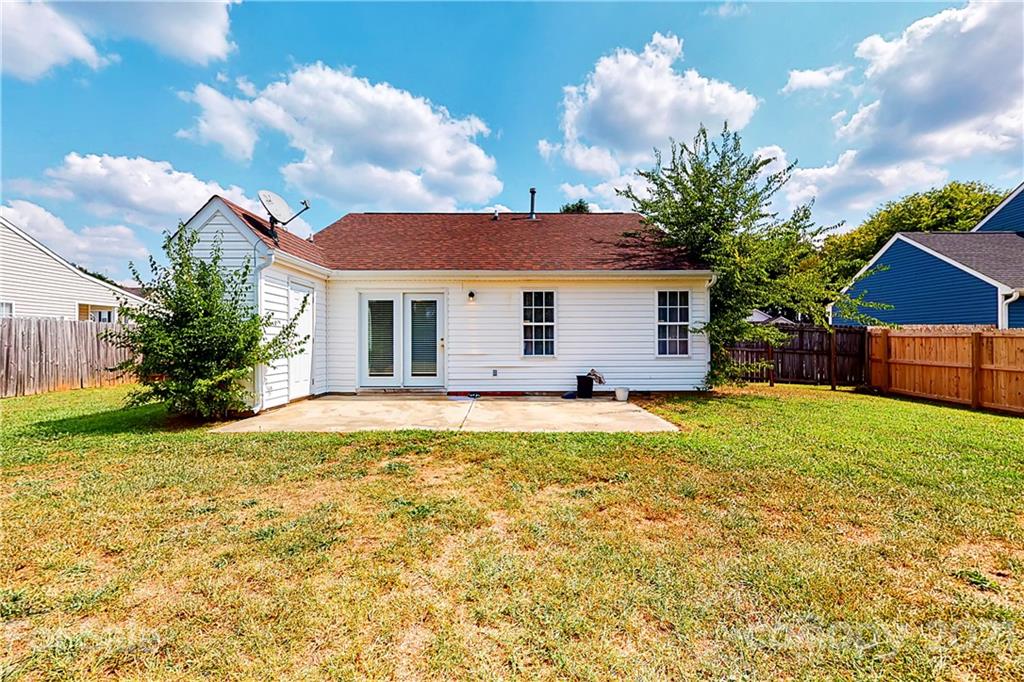 4262 Barley Street Southwest Concord, NC 28027 - Photo 23 of 27 a view of a house with backyard and garden