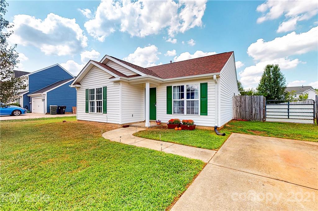 4262 Barley Street Southwest Concord, NC 28027 - Photo 26 of 27 a view of a house with a yard and plants