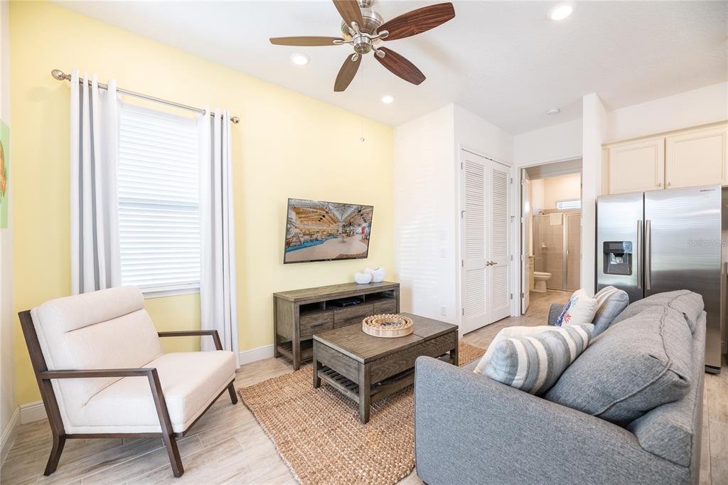 2956 Salted Rim Road Kissimmee, FL 34747 - Photo 4 of 12 a living room with furniture and a window