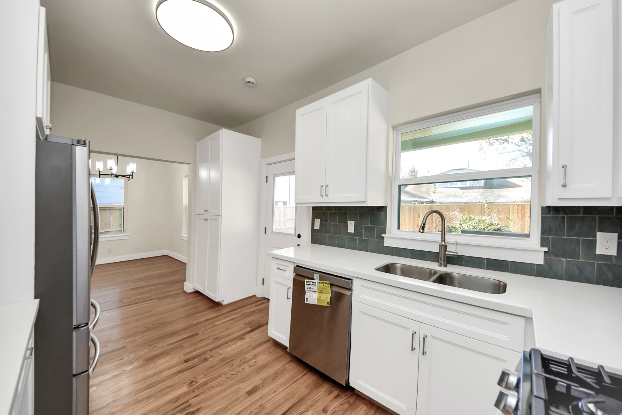 122 Sidney Street Houston, TX 77003 - Photo 7 of 17 Kitchen with lots of natural light, who doesn't love a window love the sink