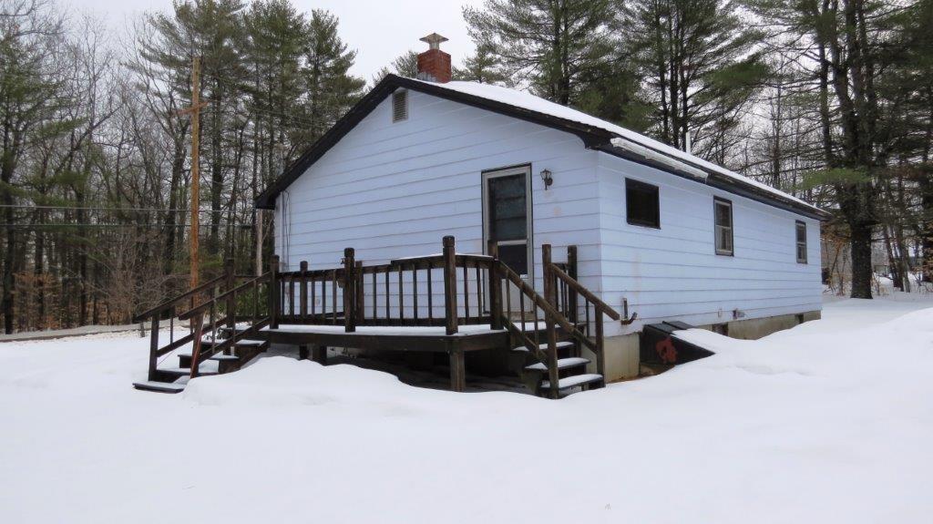 Side of property and Deck