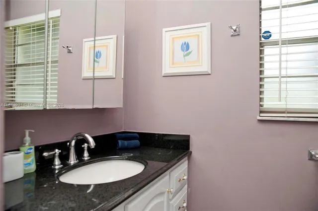 a potted plant sitting in front of a house