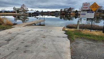an aerial view of a house with outdoor space