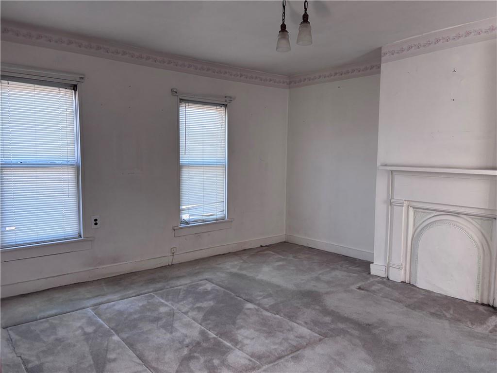 1776 Main Street Allenport, PA 15412 - Photo 13 of 16 a view of empty room with window and fireplace