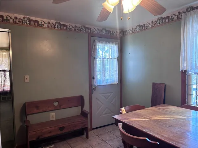 a room with furniture and chandelier
