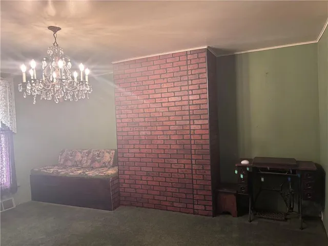 a view of a chandelier in big room