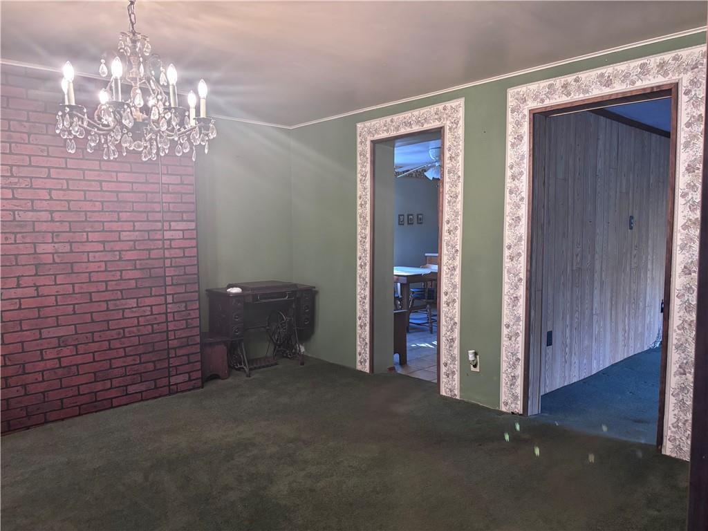 1776 Main Street Allenport, PA 15412 - Photo 6 of 16 a view of a chandelier in big room and chandelier